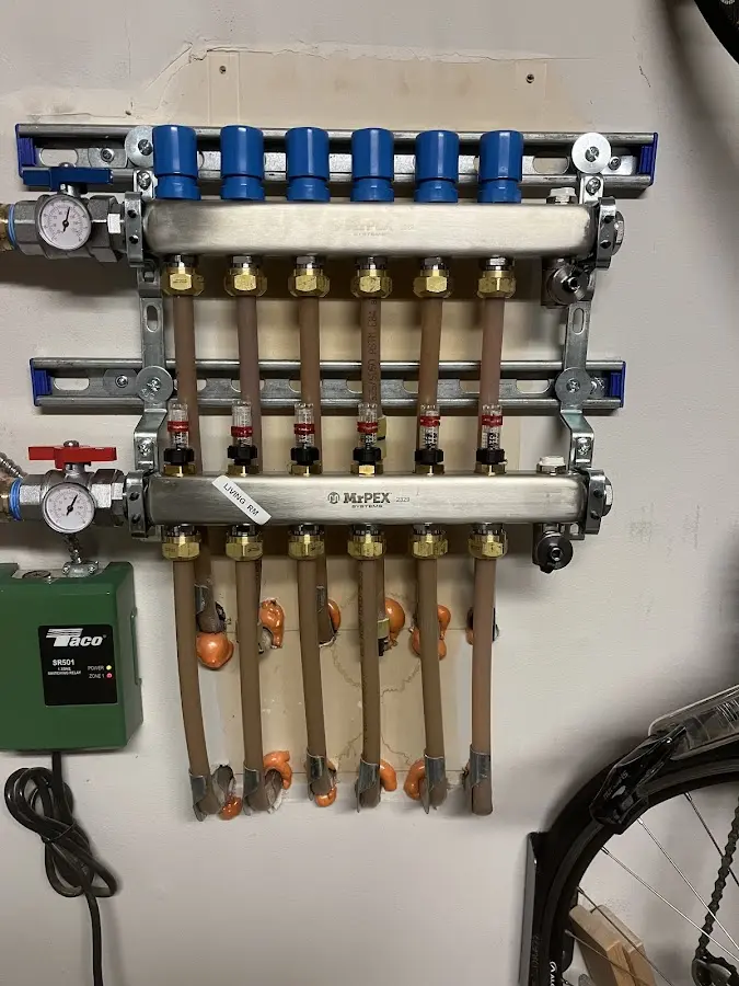 Plumber performing Water Heater Repair at a residential property in Morrisville